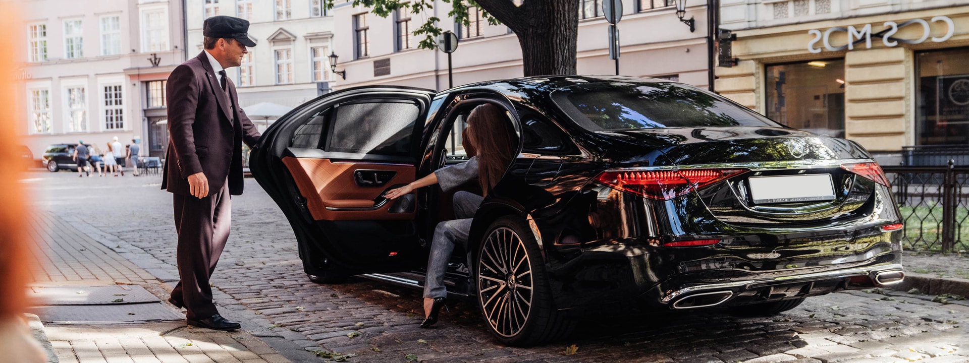chauffeur-in-Manchester-opening-car-door
